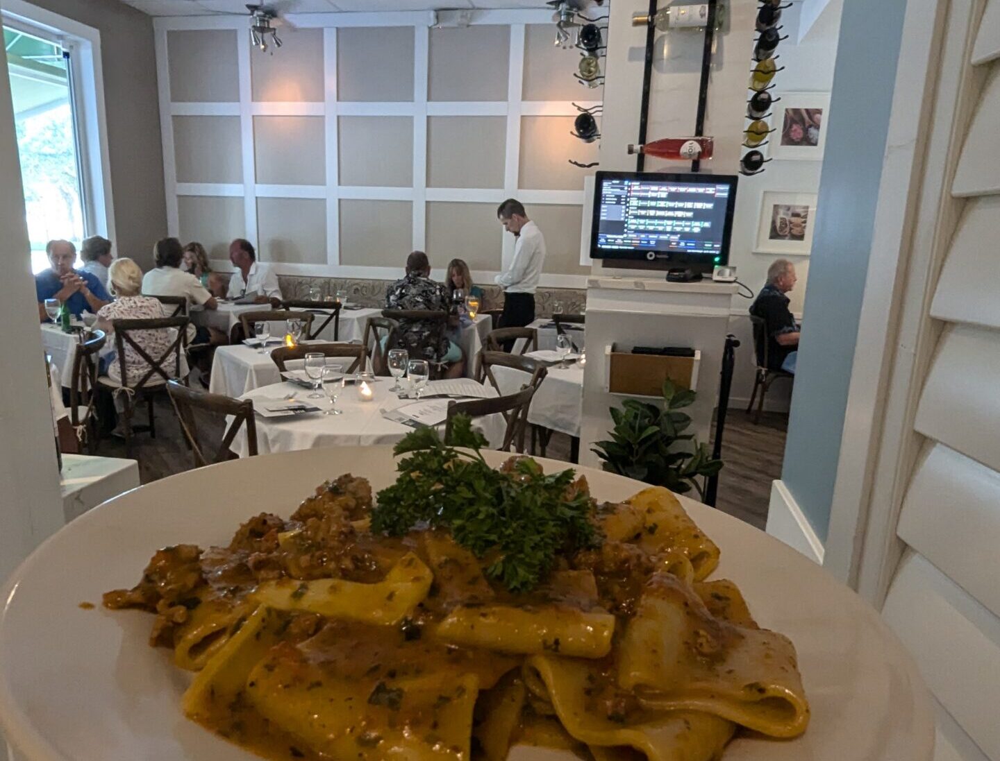 The welcoming entrance of Pepe & Sale, a premier restaurant in downtown Stuart, FL.