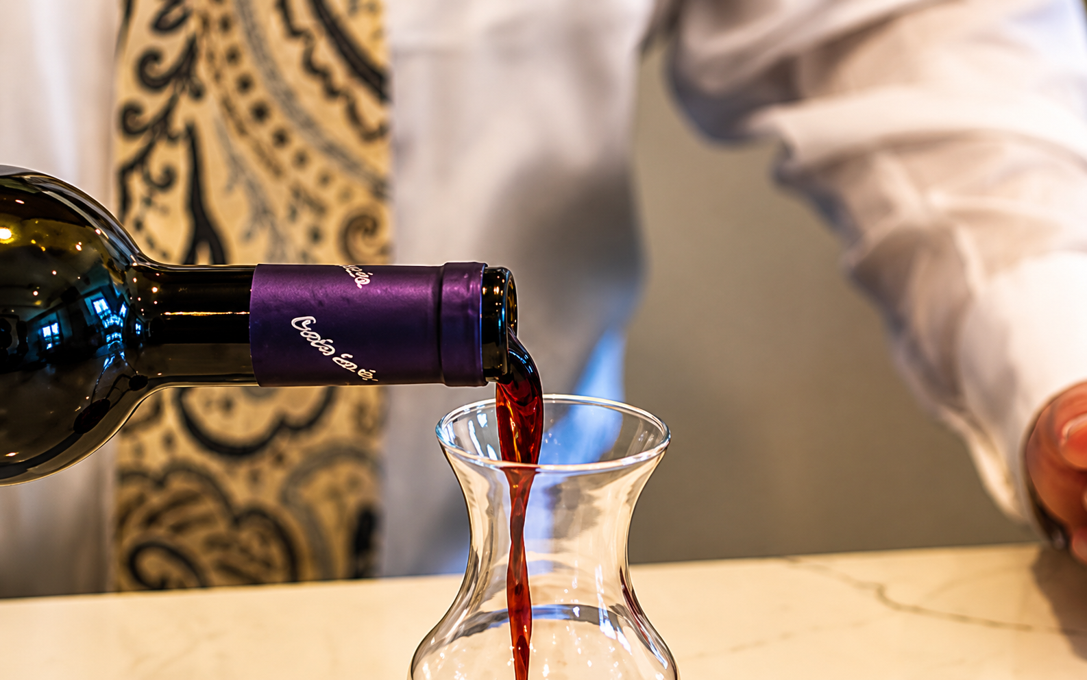 A premium wine pouring experience at the exclusive Pepe and Sale Italian wine dinner in Stuart FL