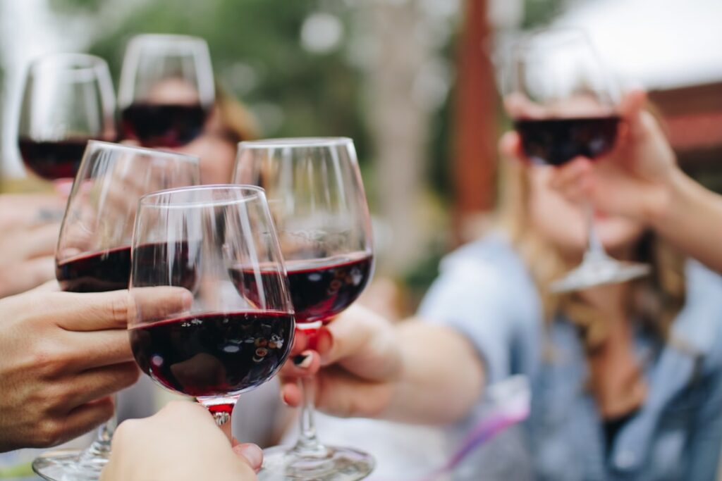 Pouring a premium glass of Italian wine at the exclusive Pepe and Sale wine tasting event in Stuart FL