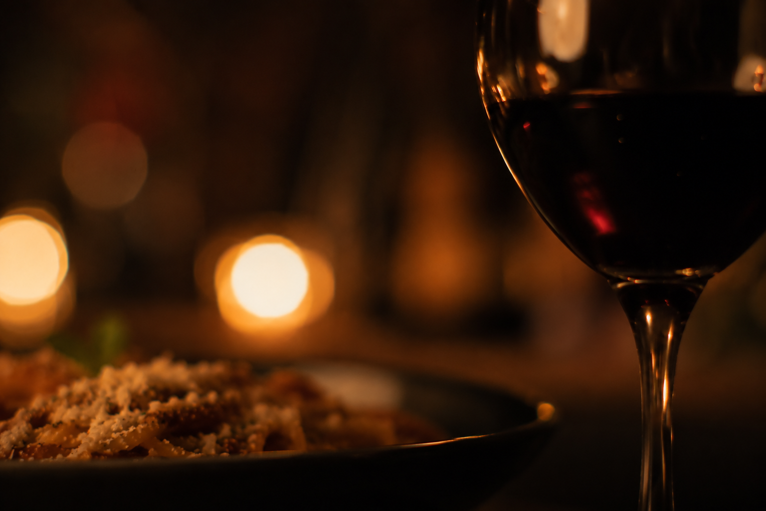 A beautifully lit, candlelit fine dining table for two at Pepe & Sale, setting the premium standard for romance on the Treasure Coast.